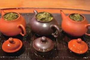 紫砂壶开壶用普洱好还是乌龙茶
