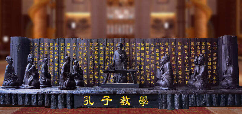 桂林有组乌木被雕刻成孔子教学
