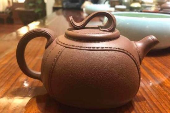 泡茶用坭兴陶和紫砂壶哪个好_紫砂壶比坭兴陶壶好吗？