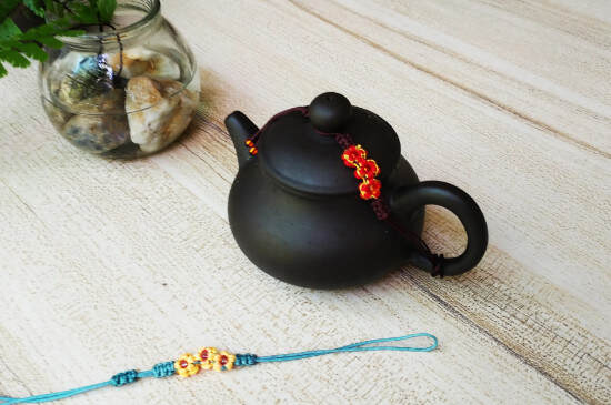 茶壶绳怎么绑茶壶盖上