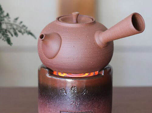 紫砂壶能用明火加热吗